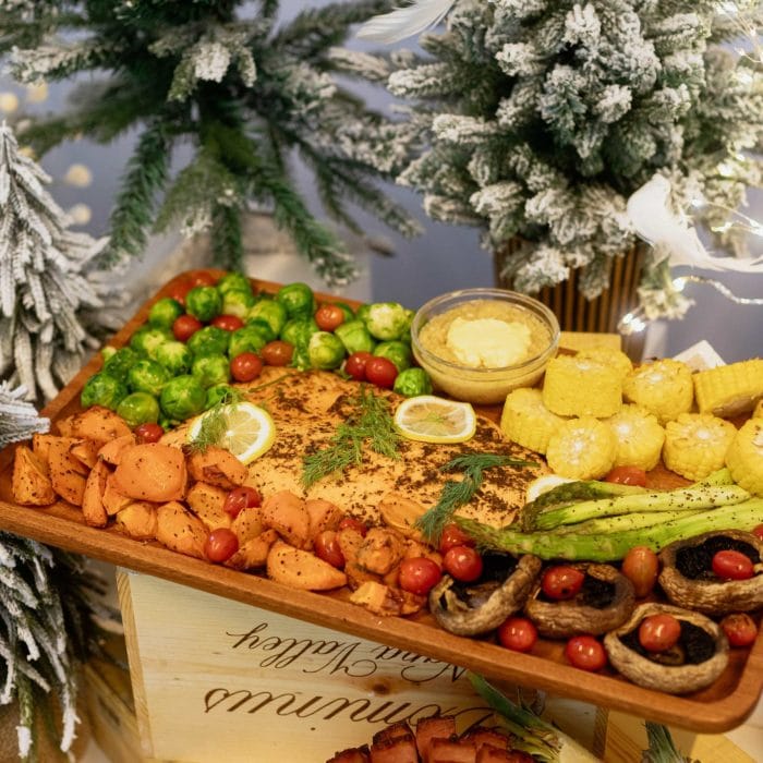 In the Holiday Spirit Set Menu with Oven-baked Salmon (from $940 for 20pax) (1 Nov-1 Jan 2024)